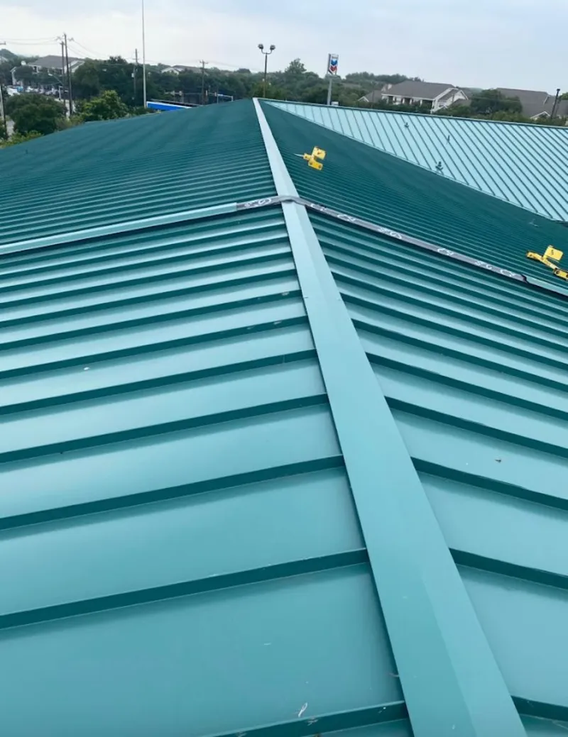 Green commercial metal roof ridge and valley for Metal Roof Repair in Hanover